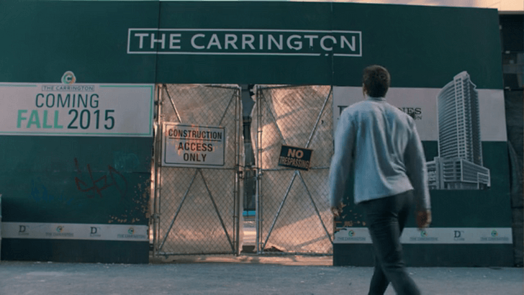 The entrance gate to The Carrington construction site