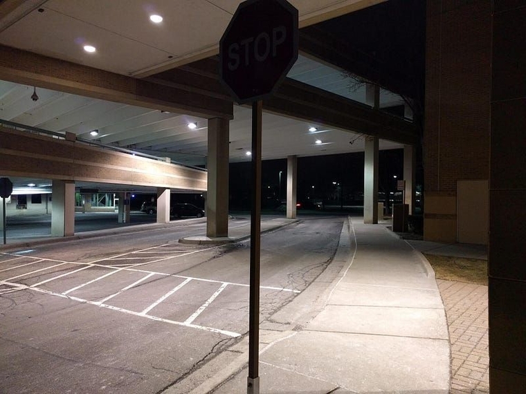 The curb across from the southeast parking structure.