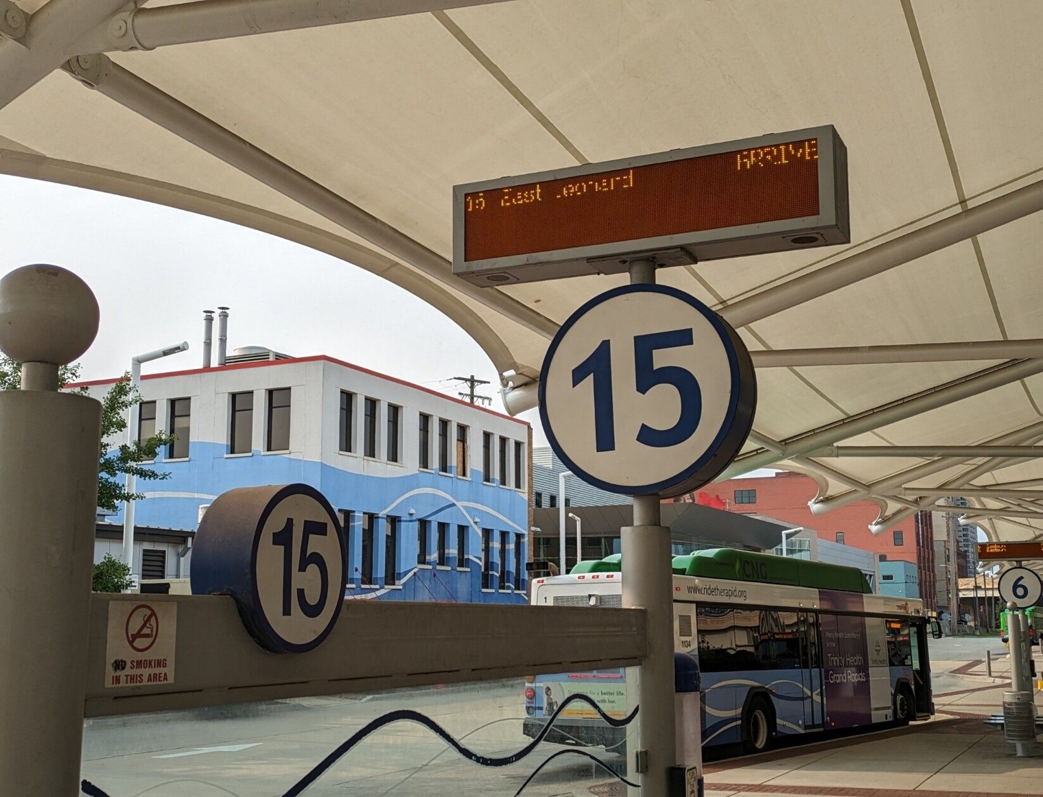 Bay 15 at Rapid Central Station with a sign saying the bus is due to arrive now