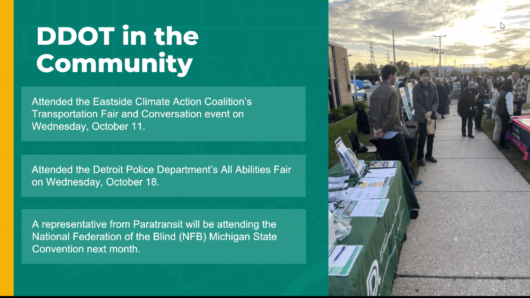 A slide titled "DDOT in the Community" with a picture of staff tabling at a large event. The table is green with various flyers, bus schedules, and meeting information leaflets. Text reads, "Attended the Eastside Climate Action Coalition's Transportation Fair and Conversation event on Wednesday, October 11th. Attended the Detroit Police Department's All Abilities Fair on Wednesday, October 18th. A representative from Paratransit will be attending the National Federation of the Blind Michigan State Convention next month."