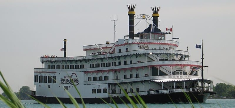 The Detroit Princess, a four-deck white steamboat with red trim and black smokestacks