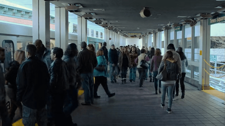 A large crowd on the People Mover platform