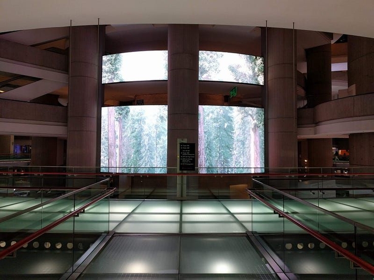 Another angle of the suspended walkway, which surrounds large displays showing various landscapes and GM advertisements