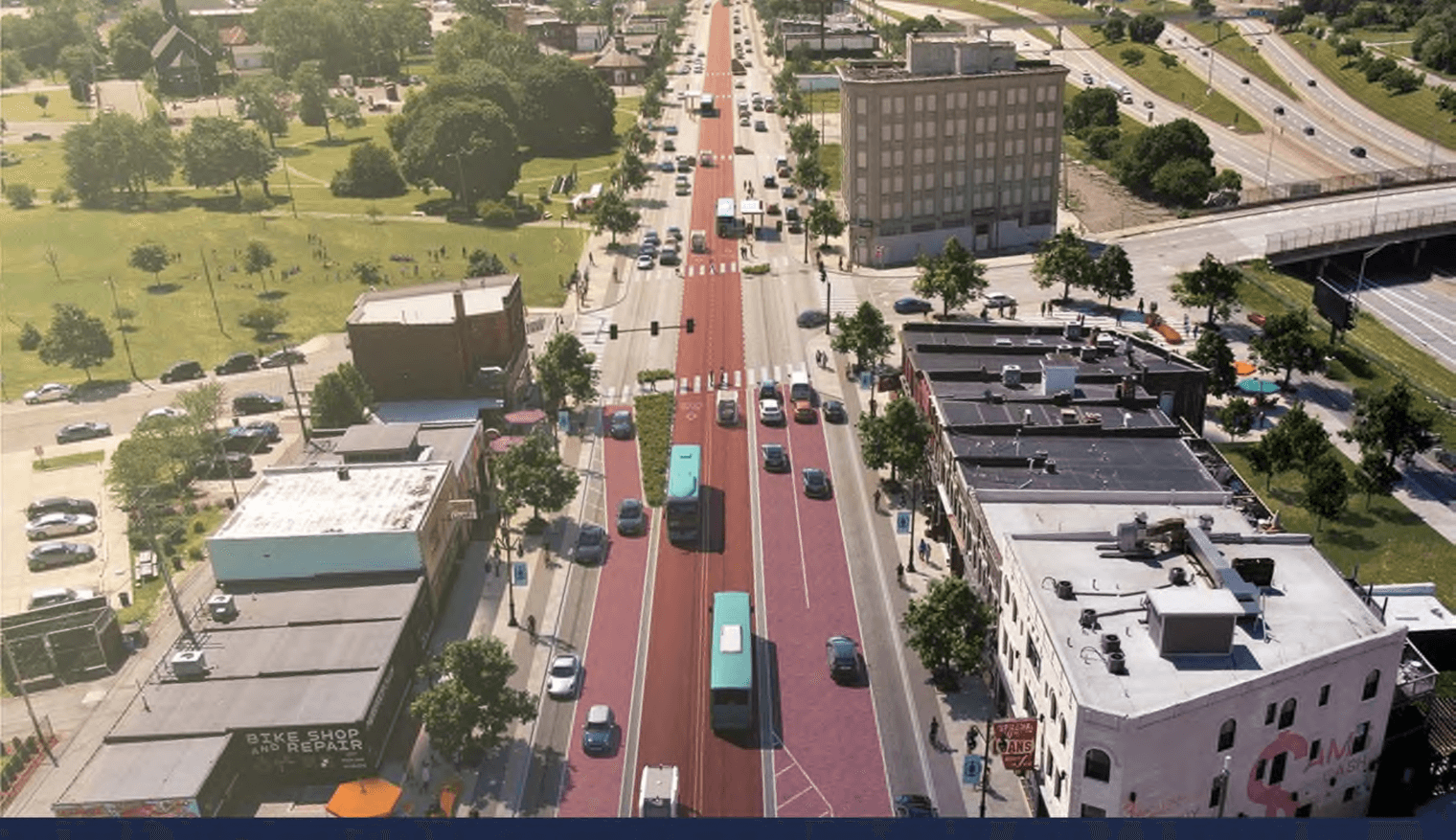 A render of the proposed bus lane installation as seen from Michigan Avenue and 14th Street. The two center travel lanes are painted red and run alongside center boarding platforms on concrete islands that separate bus traffic from vehicular traffic.