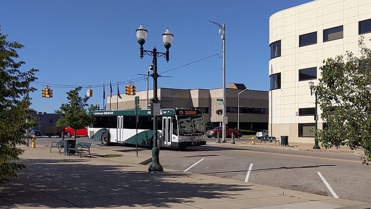 A SMART bus passes by the former site of the shelter.