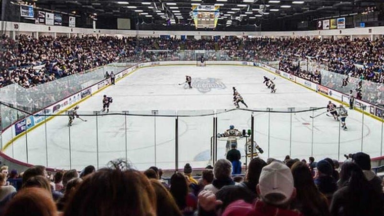 Inside the hockey arena, a concrete bunker with no windows