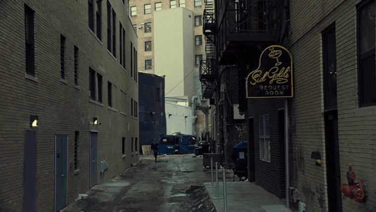 A Detroit alleyway, with the neon sign for Sid Gold’s visible