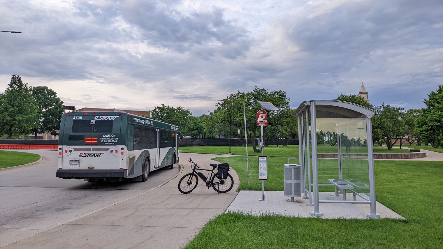 A SMART bus on Route 790 staging at the shelter in the traffic circle at Oakland University