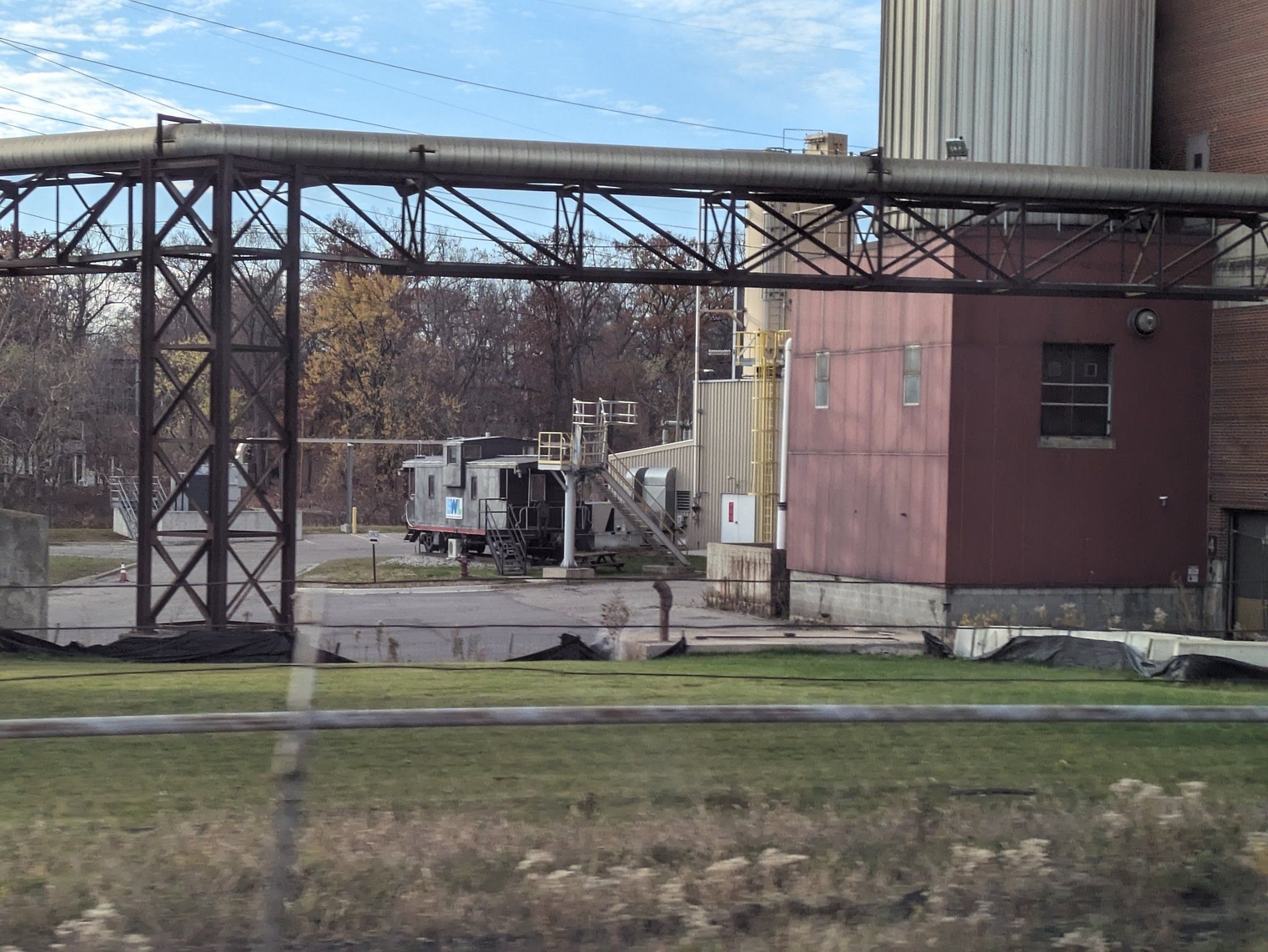 Board of Water and Light caboose on the property of the Eckert power plant