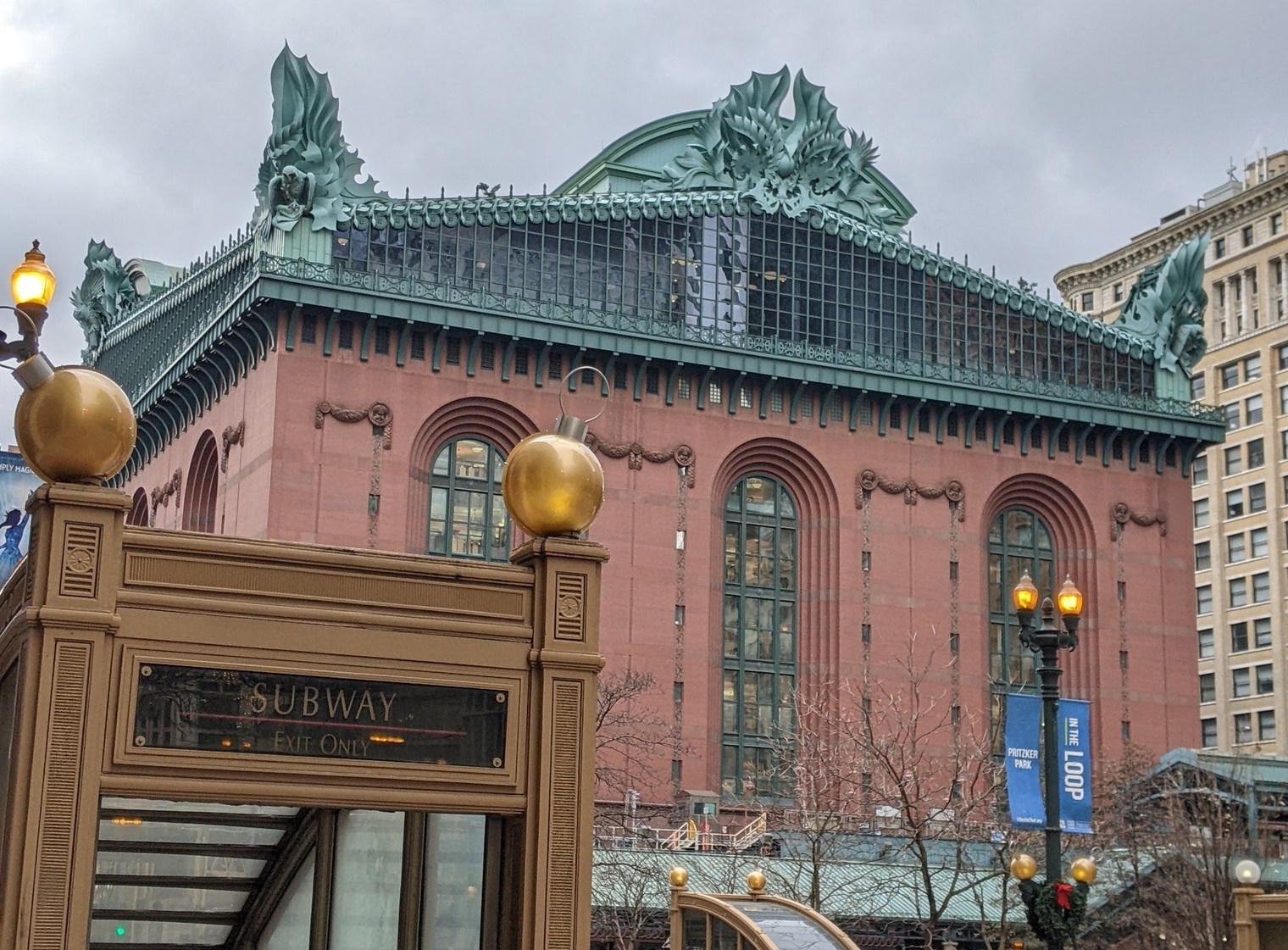 Library exterior with Red Line Subway entrance in the foreground