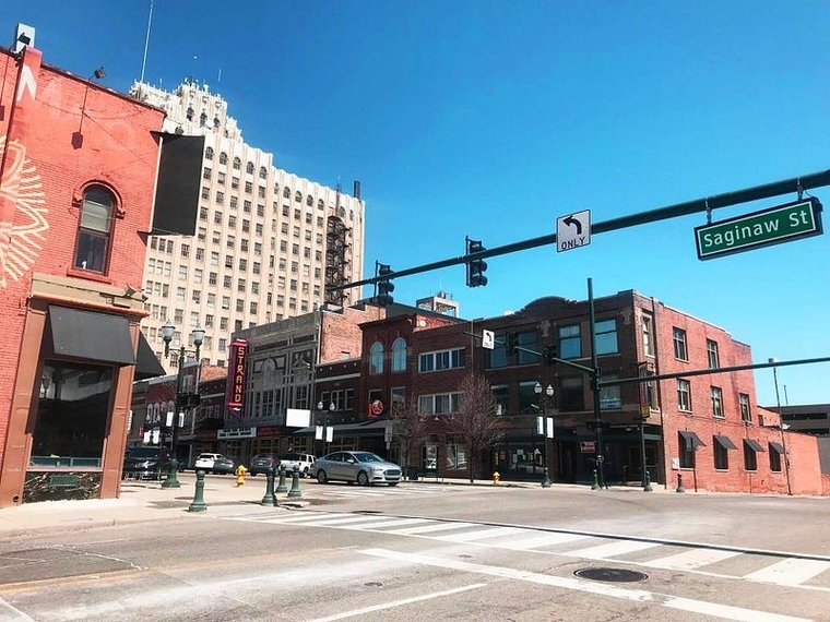 The Strand Theatre and other downtown businesses in the daytime