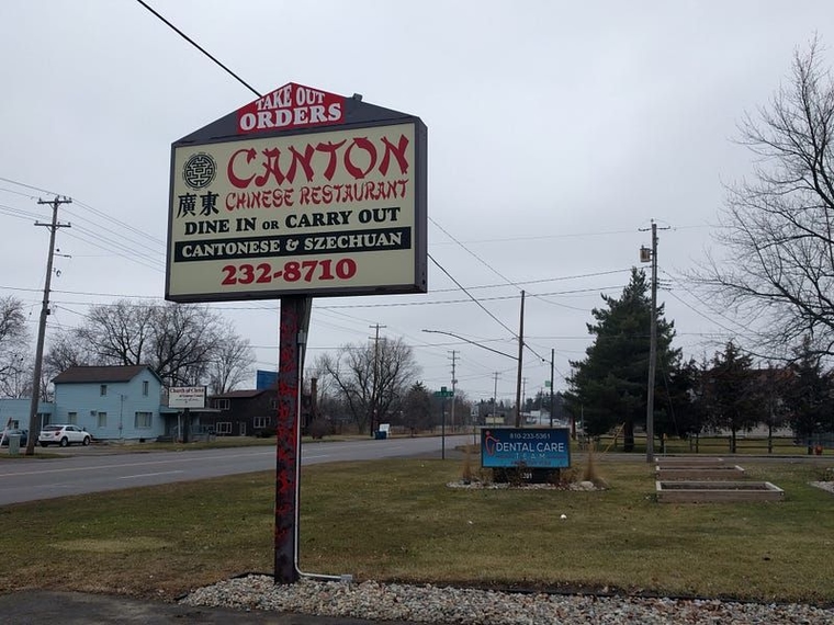 Restaurant sign reads "Canton Chinese Restaurant: Cantonese and Szechuan"