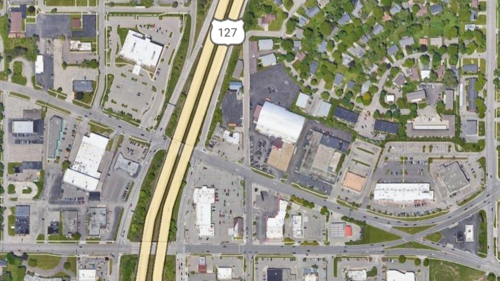 Businesses north of Frandor trapped between two major roadways next to a highway interchange that have no midblock crossings