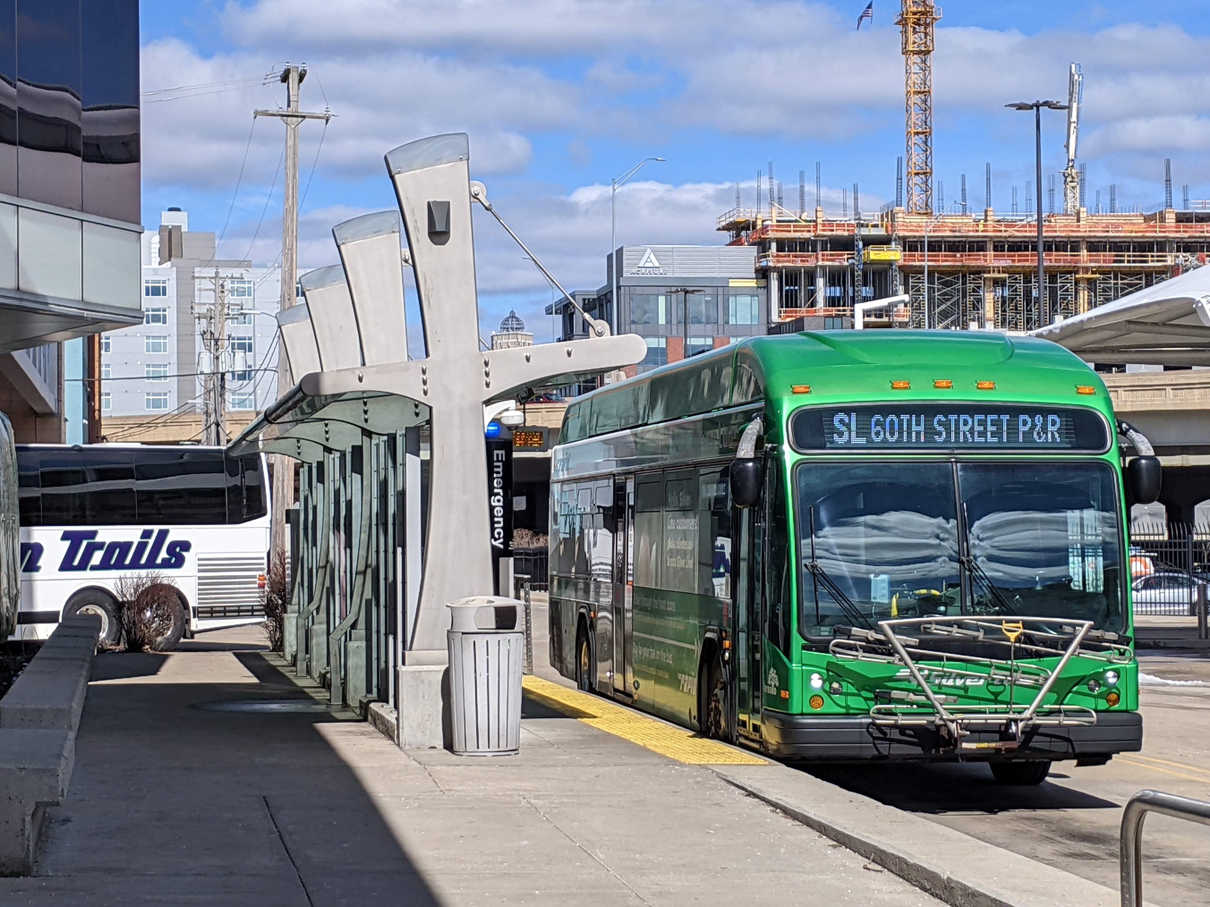 An Indian Trails bus at Rapid Central Station in Grand Rapids in the early afternoon. A Silver Line BRT bus station is steps away.