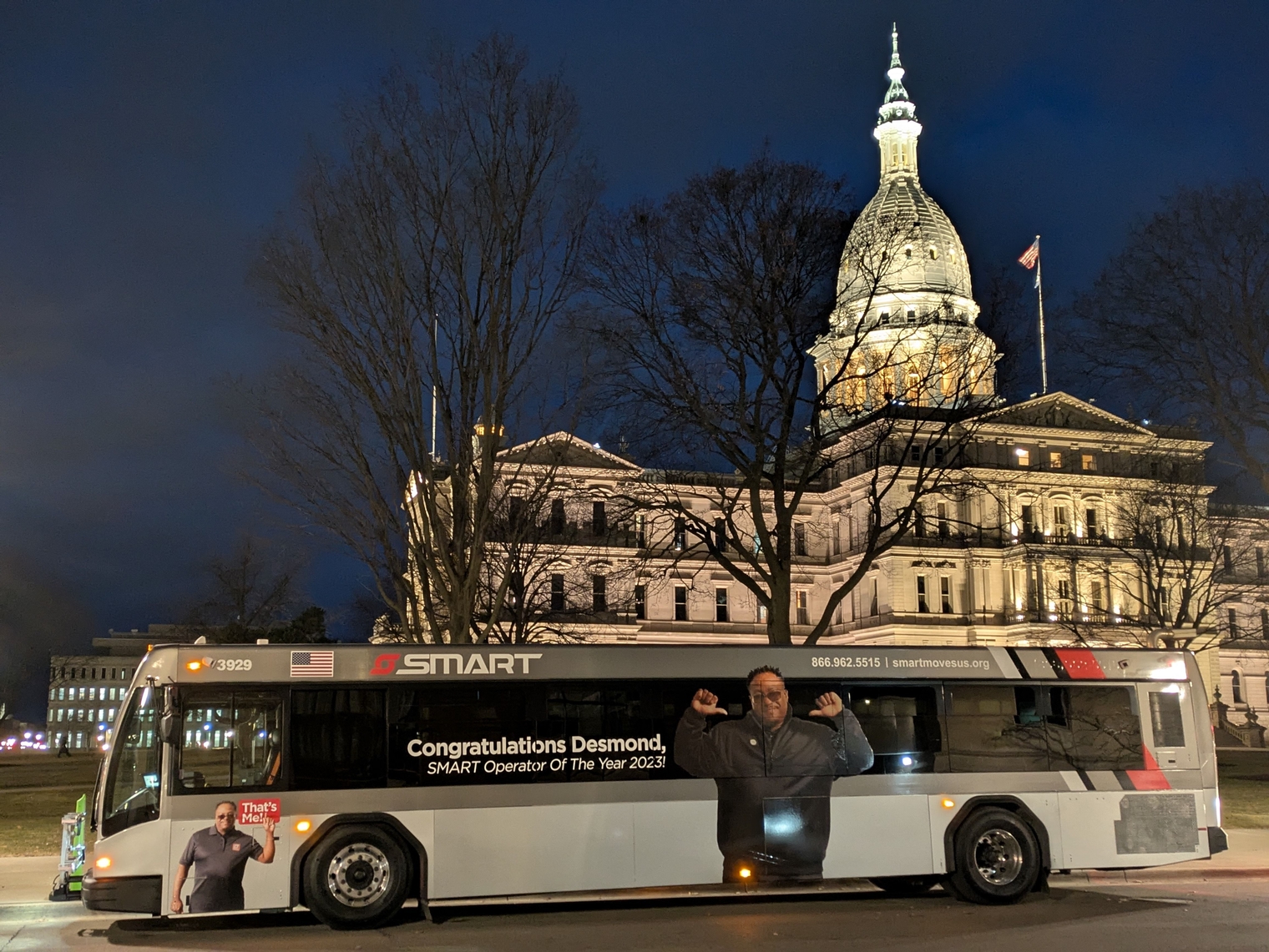 A SMART bus outside the state capitol at dawn during Transit Day in March