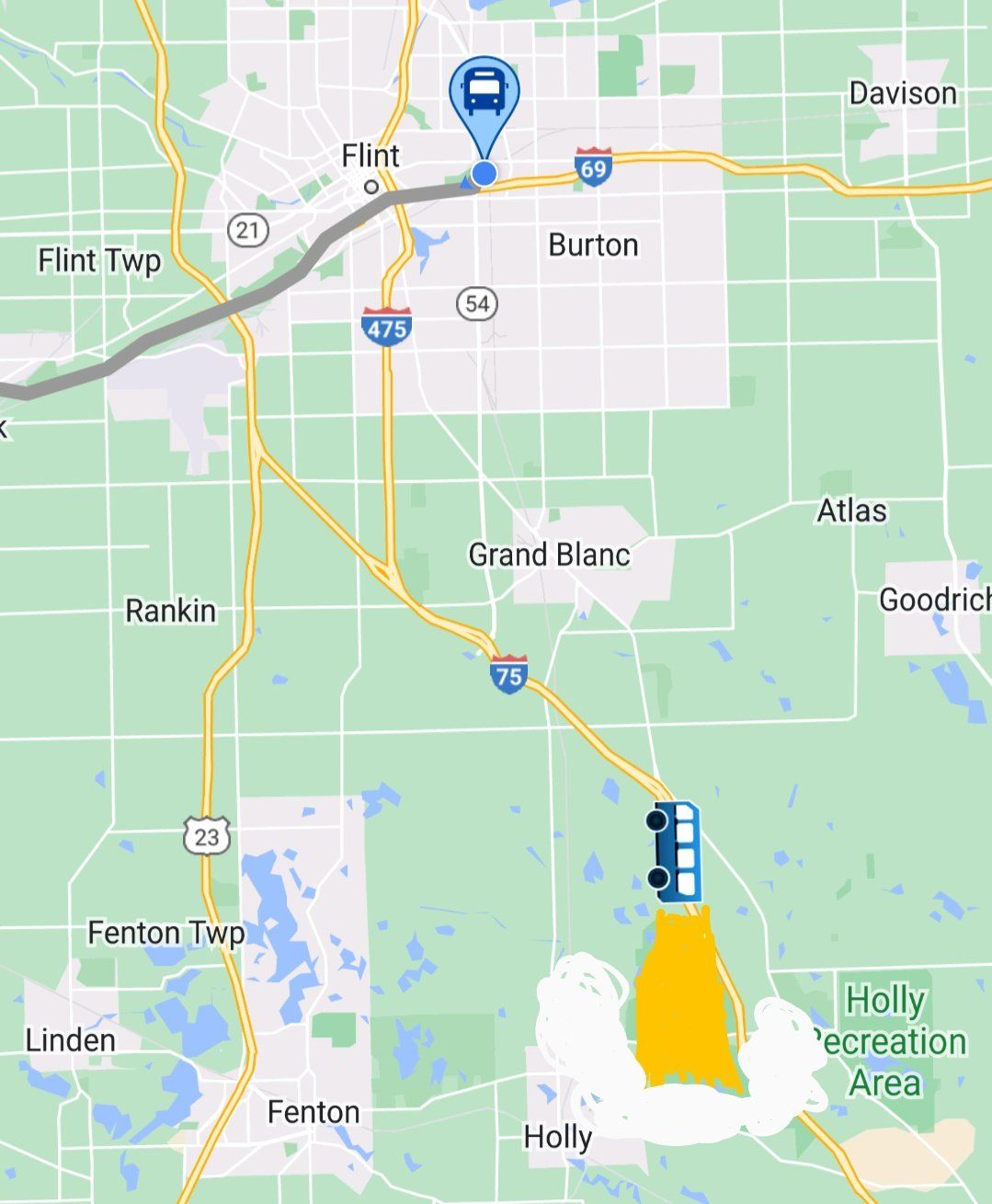 Screenshot of the Indian Trails tracker, which uses a cartoon clip art icon for the bus. The icon rotates to match the bus direction, so if it's traveling north, it looks like it's going straight upward like a rocket. I doodled an orange flame trail and a white plume of smoke beneath it.