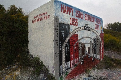 The block in Flint with a rendition of Saginaw Street painted onto it reading "Happy 150th Birthday, 1855 to 2005"