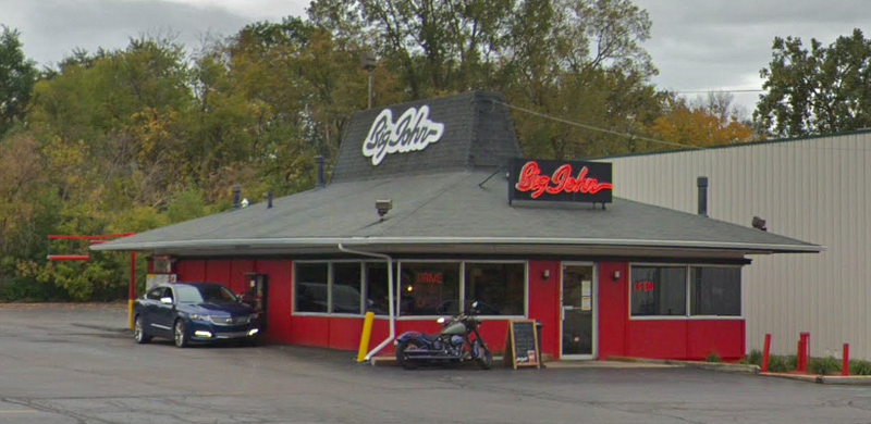 Exterior of Big John in a former Pizza Hut with the original roof intact
